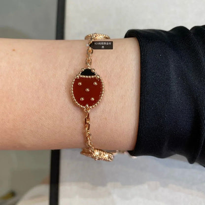 [Moco]Armband mit 5 Glücksmotiven